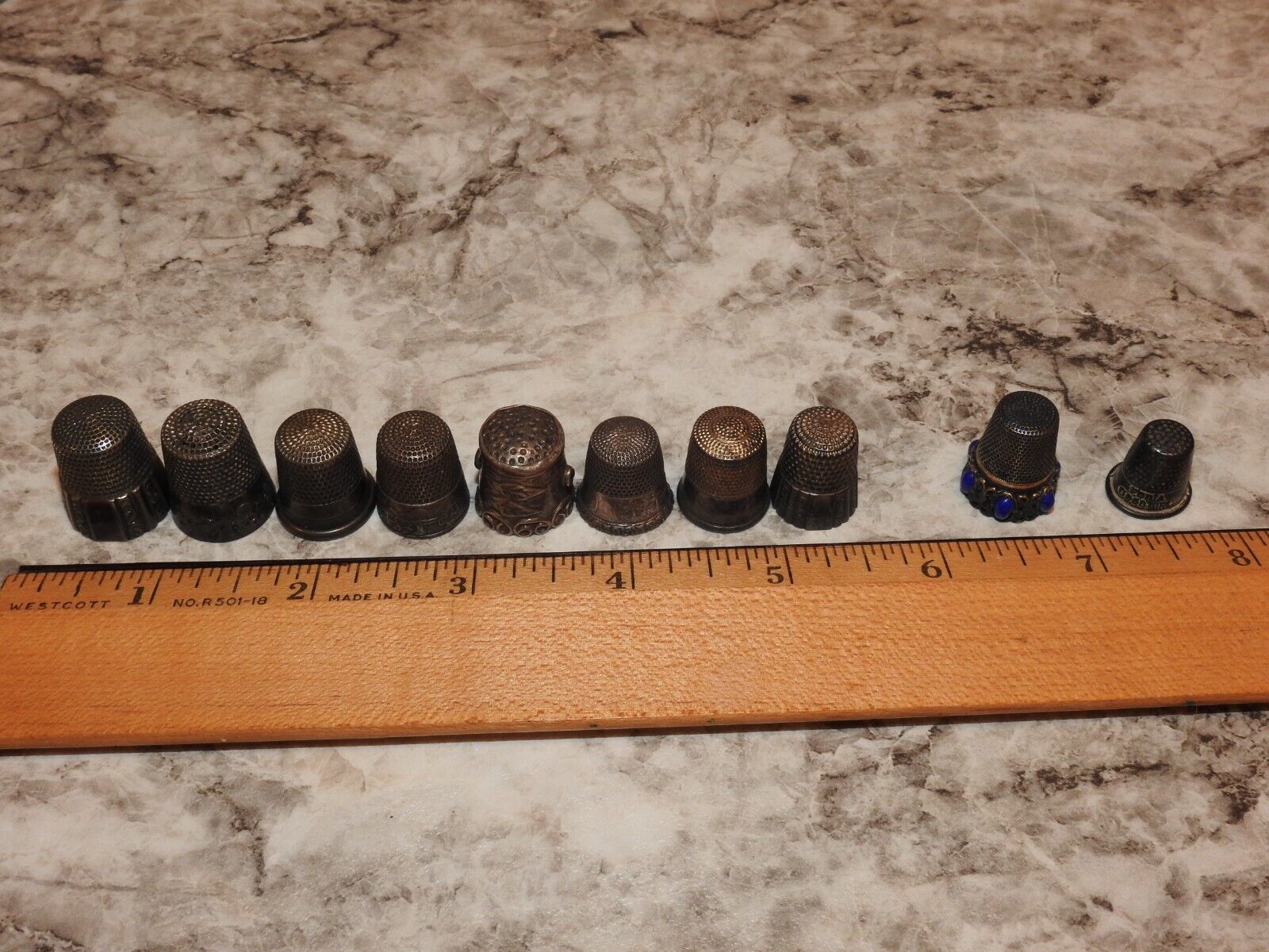 Lot 2, Eight Sterling Silver Sewing Thimbles, 1 jeweled, 1 Child's Needlework